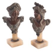 A pair of patinated metal busts of maidens, in Art Nouveau style,