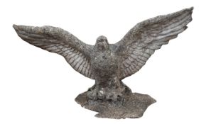A pair of stone composition garden models or pier finials modelled as eagles,