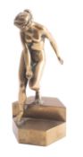A Continental bronze model of a maiden, late 19th century; portrayed nude and descending steps,