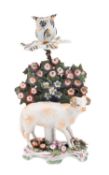 A Bow bocage candlestick figure of a ram,