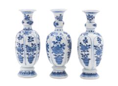 Vung Tau cargo three porcelain vases of slender oviform with knopped neck painted with six panels