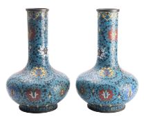 A pair of large Chinese cloisonne 'lotus' bottle vases,