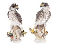 A pair of Berlin KPM models of peregrine falcons,