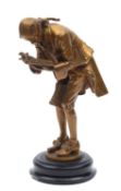 Carl Hans Bernewitz (German, 1858-1934), 'Der Bücherwurm' (The Bookworm); a gilt bronze model