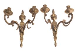 A pair of gilt metal twin light wall appliques in Louis XVI taste,
