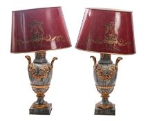 A pair of mottled green marble and gilt bronze mounted urns fitted as table lamps,