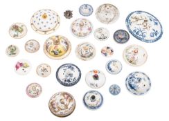 A collection of 18th and 19th century ceramic lids the majority English and Continental,