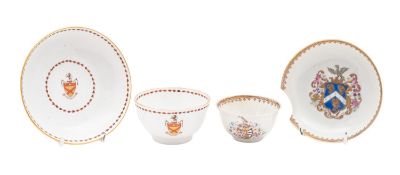 Two armorial tea bowls and saucers, one English late 18th century, the other Chinese,