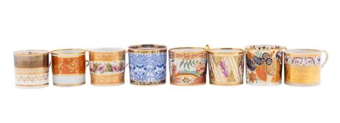 A collection of seventeen English porcelain coffee cans,