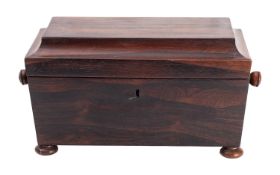 A Regency rosewood tea caddy, circa 1815; of sarcophagus form,