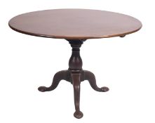 A George II mahogany oval dining table,