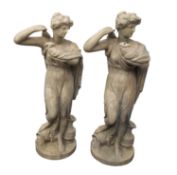 A pair of painted plaster figural torchere stands in the manner of Humphrey Hopper,
