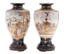 Two pairs of Japanese Satsuma earthenware vases of baluster form the larger decorated front and