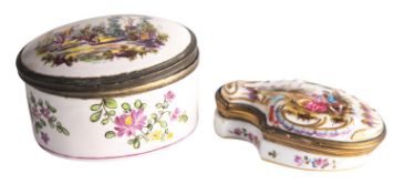 Two porcelain boxes and covers comprising an oval example painted with a gardener in a landscape,