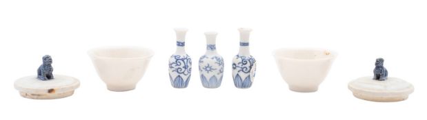 Vung Tau cargo three miniature porcelain 'Dolls House' vases painted with stylised scrolls above a