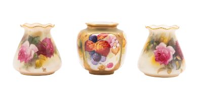 Three Royal Worcester porcelain vases comprising a pair decorated with pink and red Hadley roses on