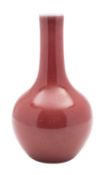 A Chinese porcelain flambé glazed bottle vase, 23cm high, [hair crack to rim].