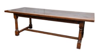 A substantial oak refectory table in 17th century style;