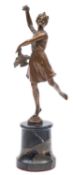 A Continental cold painted bronze model of a flower girl, circa 1900; portrayed in dance,