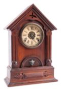 An American mantel alarm clock the eight-day duration movement striking on a bell,
