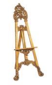 A giltwood and moulded composition gallery easel in 18th century Rococo taste,