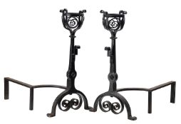 A pair of wrought iron andirons in 17th century style,