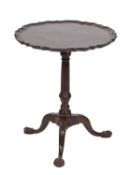 A mahogany circular occasional table in George III style, 19th Century,