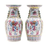 A pair of Chinese Canton famille rose yellow-ground baluster vases,