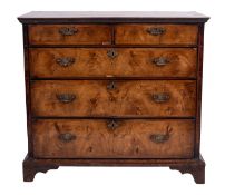 A George II walnut chest of drawers,