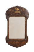 A stained and parcel-giltwood framed wall mirror in George II taste,