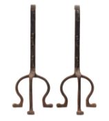 A pair of substantial wrought iron andirons,