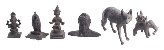 A group of six various metal models, late 19th /early 20th century; comprising a bronze of a fox,