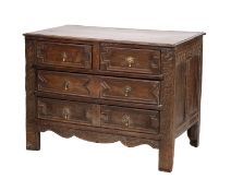 A William & Mary oak chest of drawers, late 17th century; the top with moulded edges,