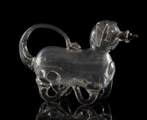 A 19th century novelty glass decanter in the form of a pig,