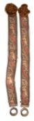 A pair of embroidered and gilt metal mounted bell-pulls,