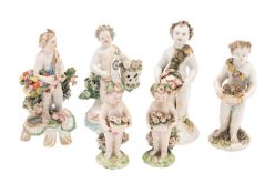 A group of four Bow figures of putti and two smaller Derby putti,