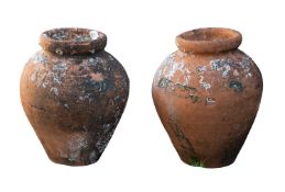 Two Portuguese terracotta octopus traps of oviform with coral encrustation, 31cm high.