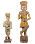A large Indian carved and painted wood Guardian figure, 20th century; and a similar smaller figure,