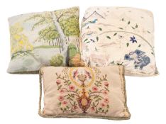 A group of nine various embroidered and fabric cushions;