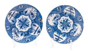 A pair of Dutch blue and white delftware pancake plates,