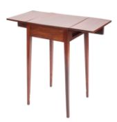 A George III mahogany tea or occasional table, circa 1800; the rectangular top hinged at each side,