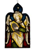 A stained and leaded glass depiction of an angel,