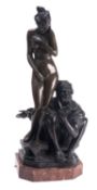 A Continental patinated bronze group of a Moor and a maiden,