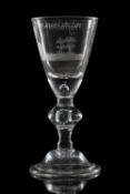 A Dutch engraved light baluster wine glass,