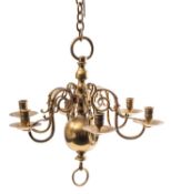 Two very similar brass six-light chandeliers in early 18th century Dutch style,