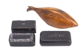 A carved treen, probably boxwood snuff box modelled as a fish,