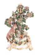 A Chelsea Aesop's Fable candlestick figure of 'The Fox in the Well' circa 1760-65 a wolf looking