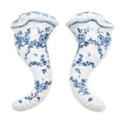 A pair of First Period Worcester blue and white cornucopia wall pockets,