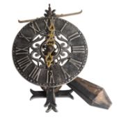 A reproduction 17th century-style wall clock the weight-driven iron movement with foliot escapement,