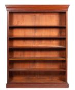 A mahogany open bookcase in George III style,